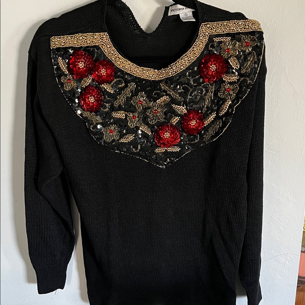 Victoria Black Sweater with Red and Gold Embellishments